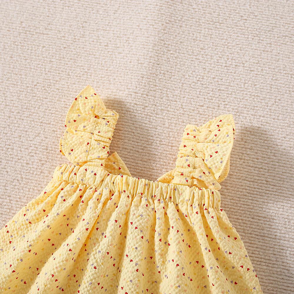 Peutermeisjes kinderkledingset van katoen, klein hartje, bedrukt, geel/roze strik, top en short_voghion.com