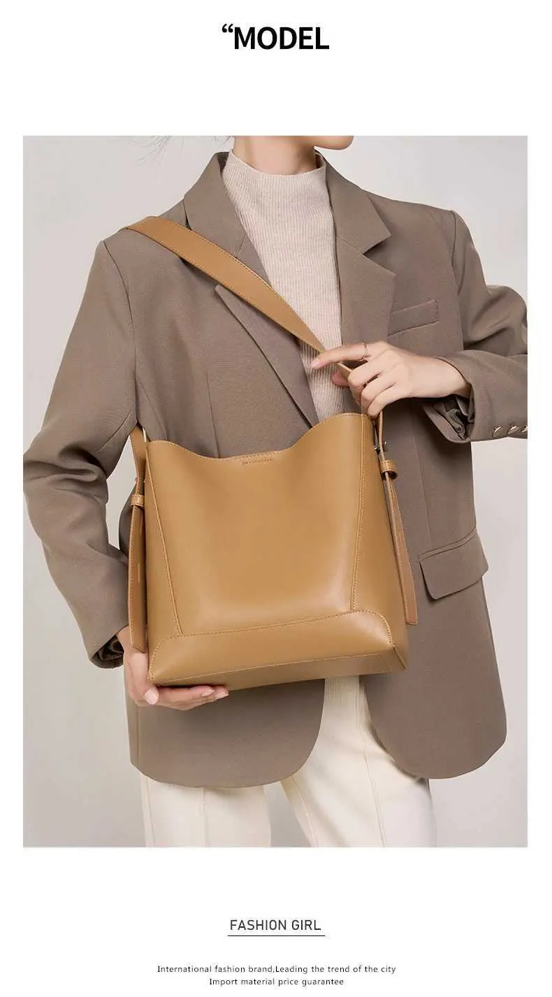 100% genuine leather shoulder large capacity denim bucket fashionable and casual womens cross bag 2391 Y241121_voghion.com