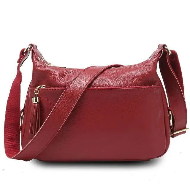 Zency 100% ægte læder moderigtig dameskuldertaske med kvast høj kvalitet hobos elegante dame crossbody-tasker sort_voghion.com