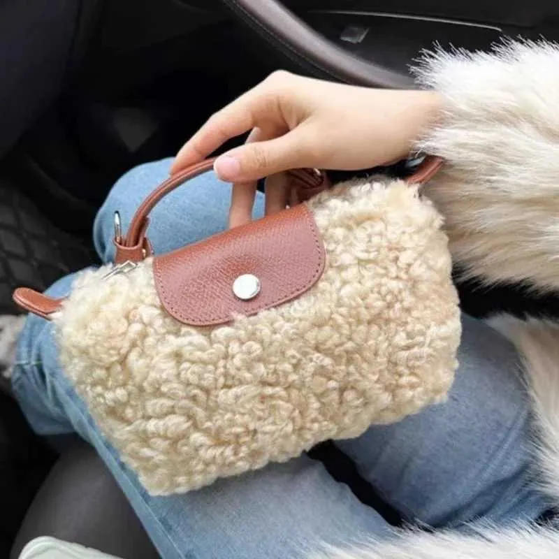 Designer Bag Sheepskin Handheld fur retro shoulder Cross body Womens designer bag Wallet and handbag Y241115_voghion.com