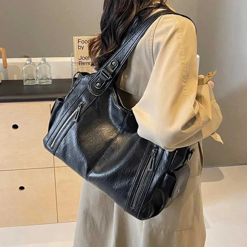 Sacs à bandoulière à compartiment intérieur souple 2024 de haute qualité aux couleurs contrastées pour femmes Mode Fermeture éclair Pu Femmes_voghion.com