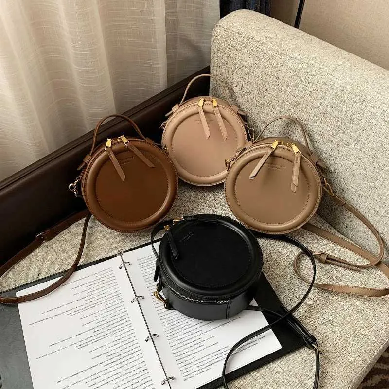 Sac à bandoulière de couleur unie pour petit sac à main rond pour femmes, sacs de créateurs de mode, sac à bandoulière en cuir, fermeture éclair pour femmes_voghion.com