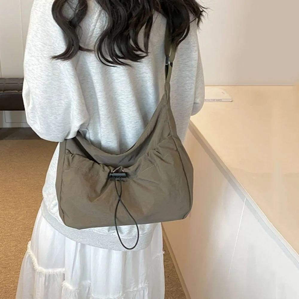 Borsa a tracolla in tela stile coreano con tracolla regolabile in nylon con coulisse e tracolla in tinta unita_voghion.com