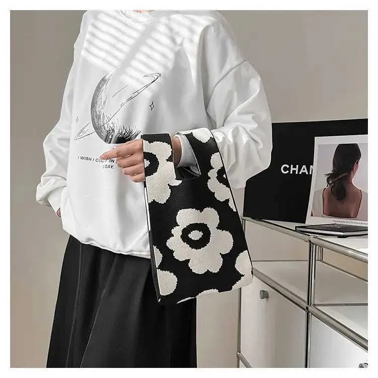 Borsa a mano in tela artistica giapponese di grande capacità, modello Geely, portafoglio con nodo casual e borsa da polso alla moda e versatile Wens_voghion.com