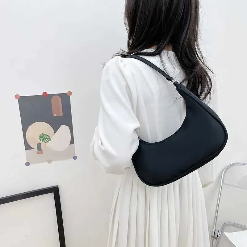 Wens Nyl Shoe 2023 Fi Solid Canvas Dumpg Unterarm Designer Tasche Cluh Geldbörse und Handtasche Y241026_voghion.com
