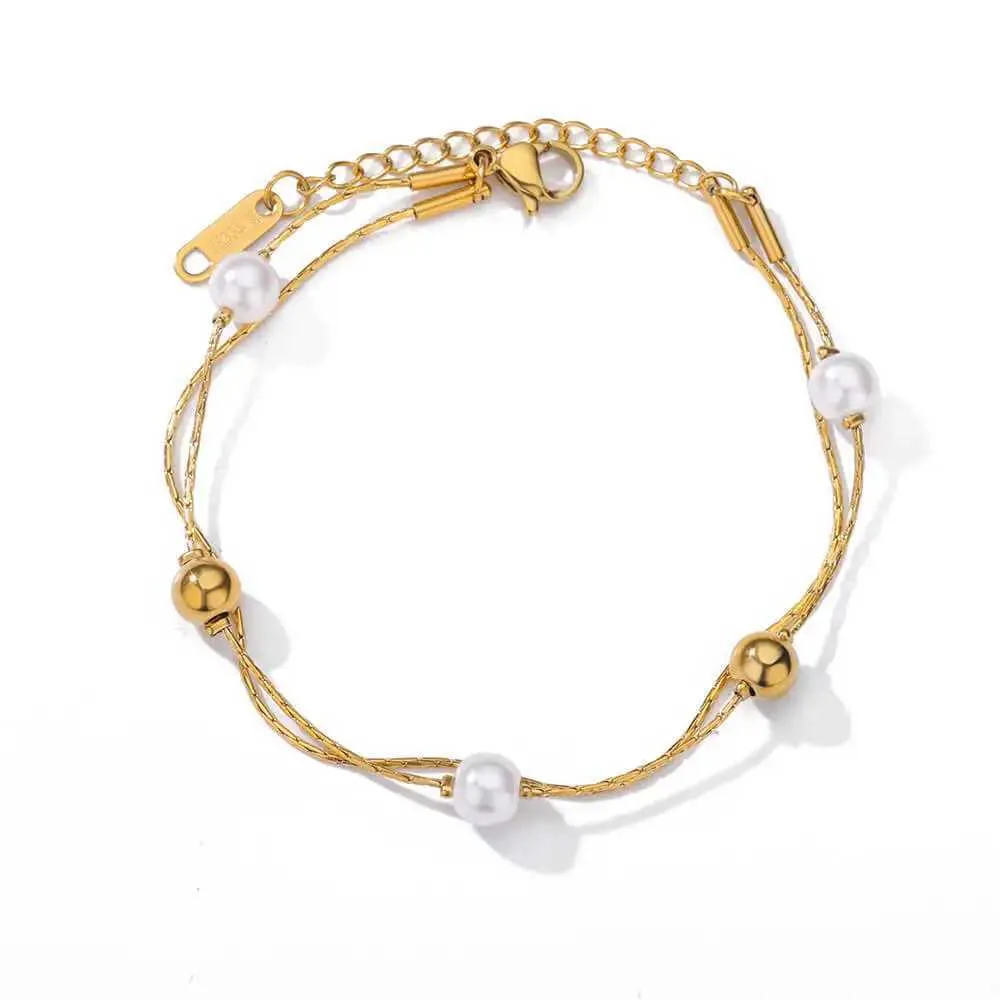 Pulsera de doble cadena con perlas en acero inoxidable dorado_voghion.com