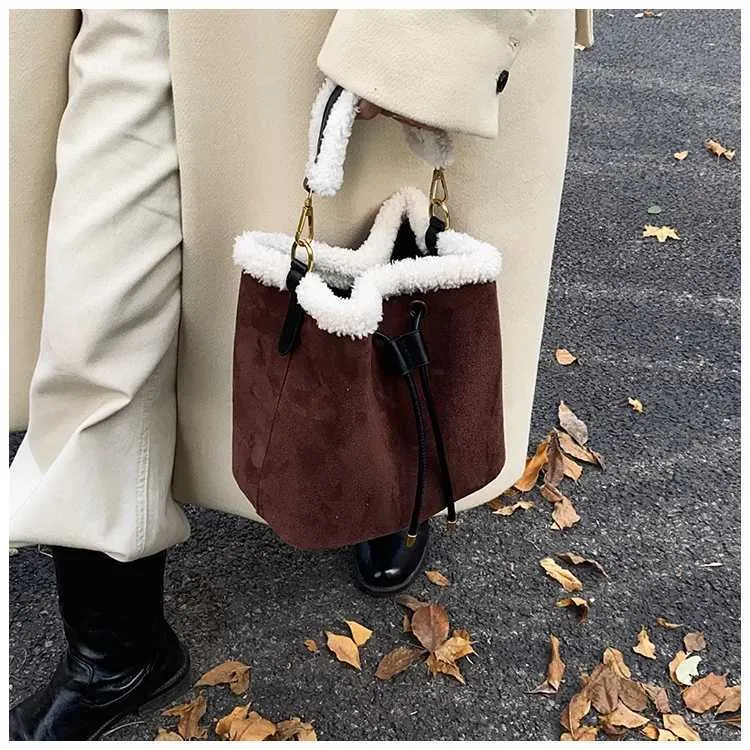 Borsa a secchiello vintage in scamosciato a contrasto tracolla_voghion.com