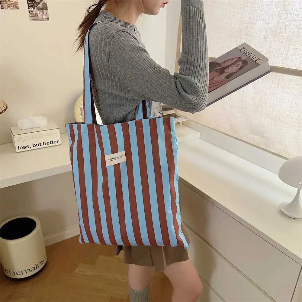 Vintage gestreifte warme Leinwand große Kapazität tägliche Einkaufstasche lässig tragbare Damen Reisehandtasche Y241109_voghion.com