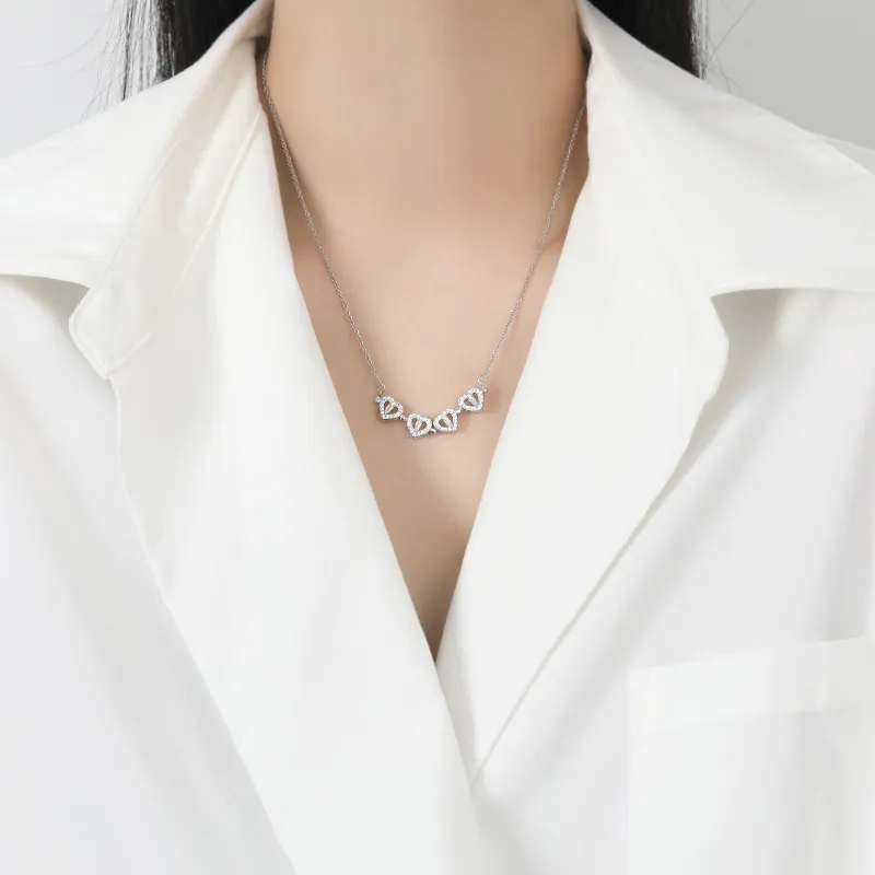 Naszyjnik z wisiorkiem koniczyna dla kobiet z magnesem w kształcie serca i stali nierdzewnej z błyszczącym złotym naszyjnikiem_voghion.com