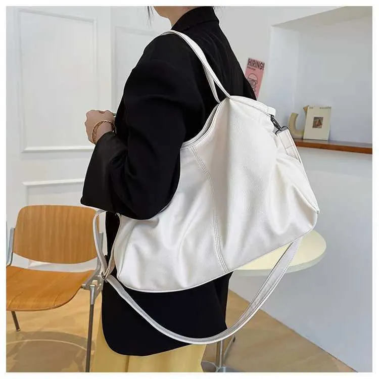 Large black shoulder large homeless shopping solid color high-quality leather cross body handbag womens travel bag_voghion.com