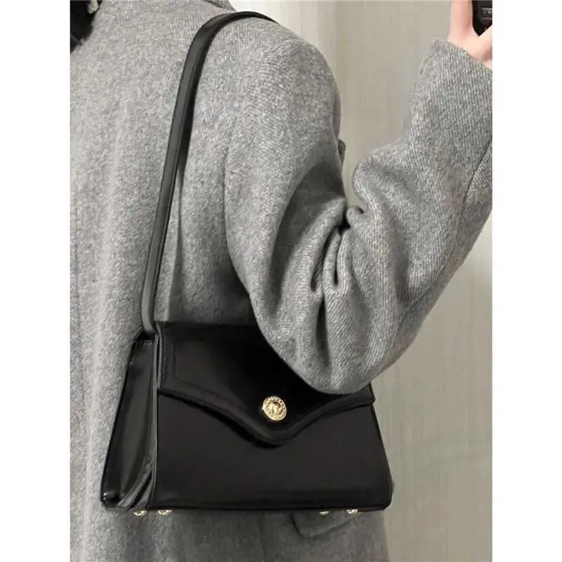 Black PU Leather Single Shoulder 2023 New Womens Buckle High Capacity Underarm Bag Designer Advanced Texture Ladies_voghion.com