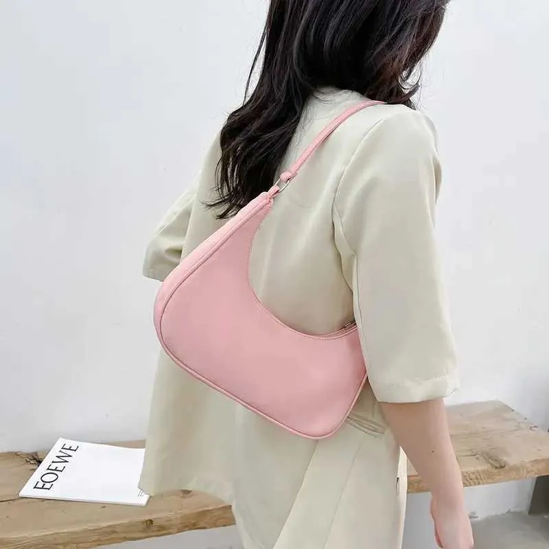 Wens Nyl Shoe 2023 Fi Solid Canvas Dumpg Unterarm Designer Tasche Cluh Geldbörse und Handtasche Y241026_voghion.com