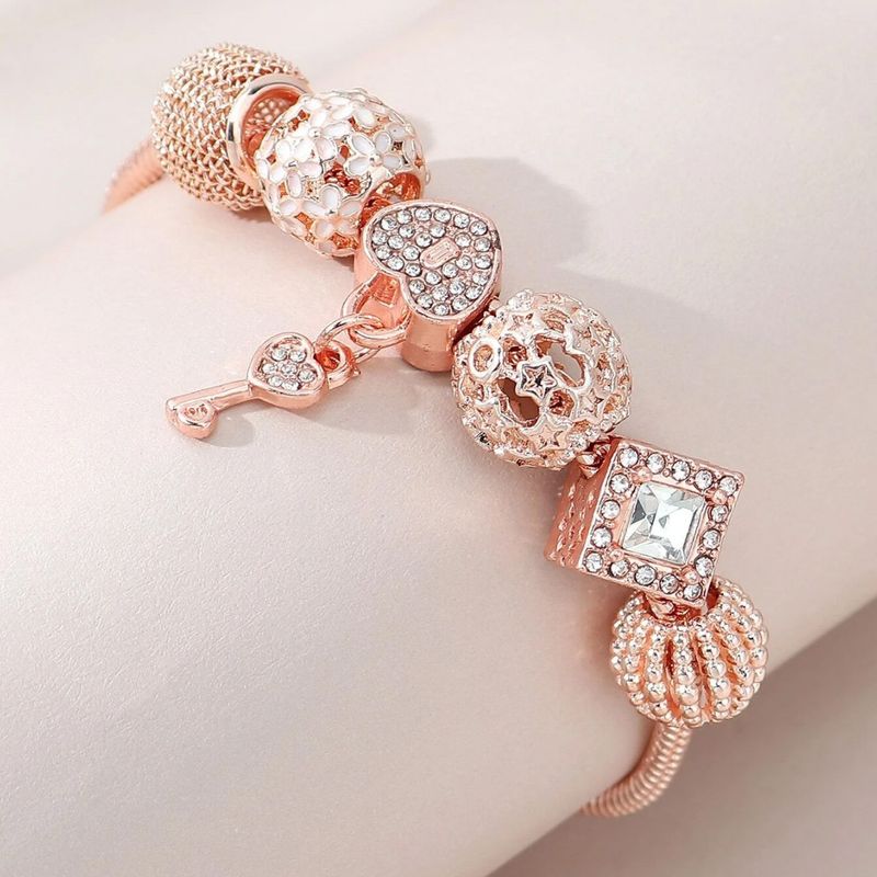 Nuovo braccialetto di perline con lanterna cava da donna con ciondolo a forma di cuore e chiave_voghion.com