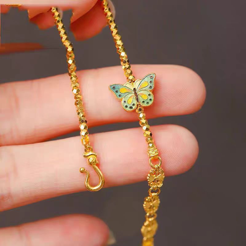 Prinsessan på flykten Bränd blå fjäril guldfärg blinkande laser trasigt Sier några få taels av disco pärlor armband_voghion.com