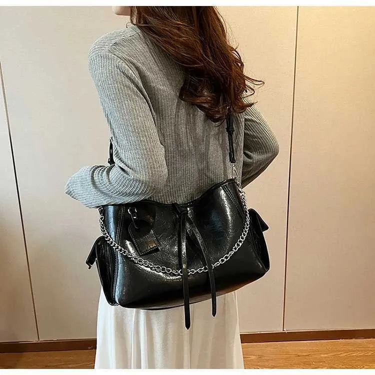Dames leren schoudertas met grote capaciteit casual crossbody tas_voghion.com