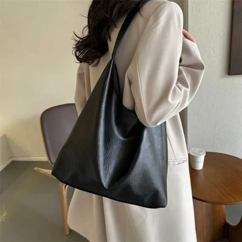 Vintage schoudertas en tote bag van kunstleer voor dames_voghion.com