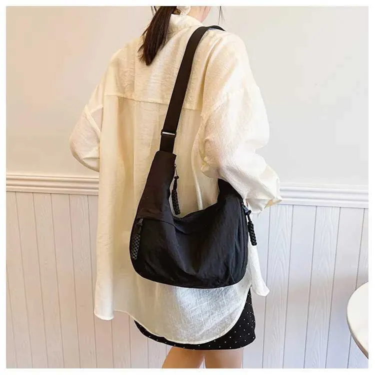 Version coréenne à la mode et minimaliste dumpg populaire cette année, nouveau sac à bandoulière de haute qualité, fourre-tout de grande capacité_voghion.com
