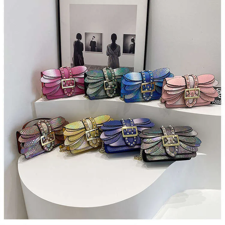 Borsa donna a tracolla con catena e motivo a serpente_voghion.com