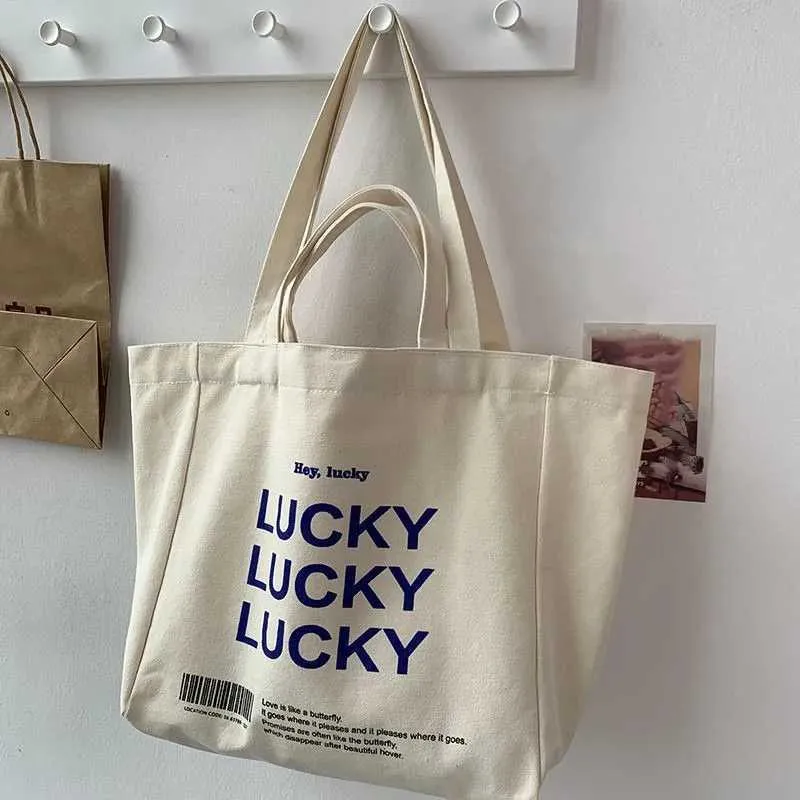 Large capacity retro letter printed canvas handbag with foldable design - perfect for casual shopping and daily use_voghion.com