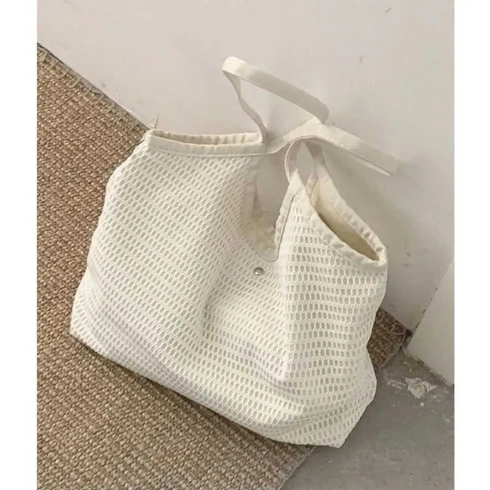 Solid color fabric large capacity beach canvas shoulder womens simple shopping bag Y241011_voghion.com