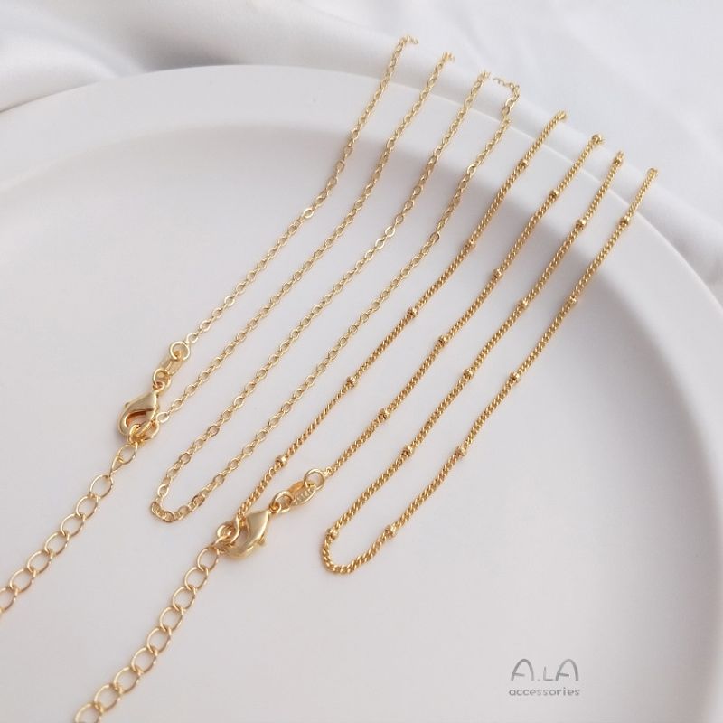 Catena di estensione a goccia d'acqua con perlina piatta O in acciaio JF14K con finitura in oro vero, colore preservato, clavicola da 45 cm_voghion.com