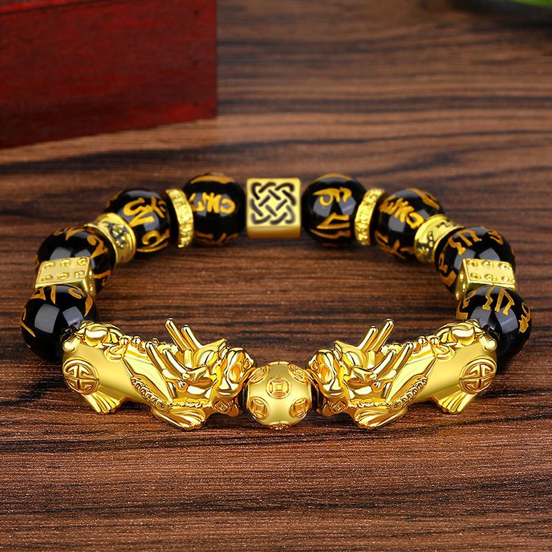 Bracciale unisex con perline di mantra a sei caratteri in ossidiana color oro e moda_voghion.com