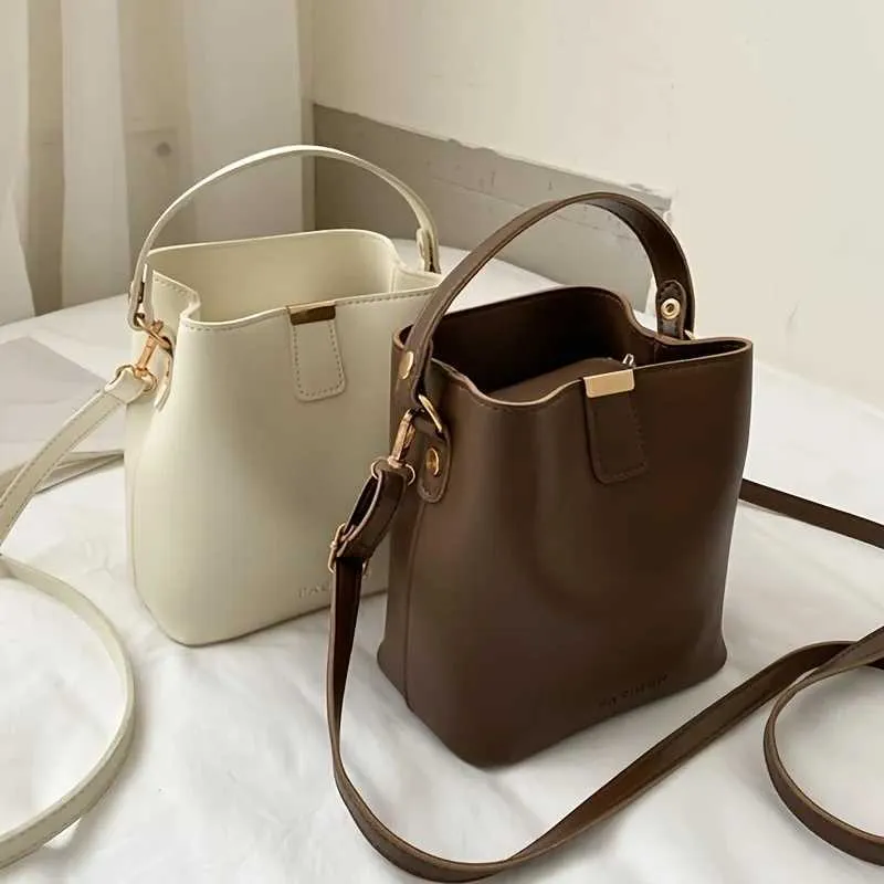 Mini-Beuteltasche in Volltonfarbe, minimalistische Umhängetasche, stilvolle Handtasche für Damen, Geldbörse C241216_voghion.com