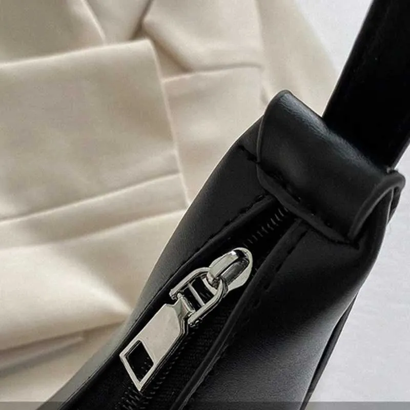 Borsa a spalla a mezzaluna donna elegante in ecopelle_voghion.com