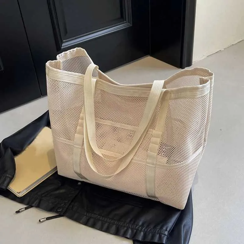 Hollow large capacity makeup storage womens multifunctional mesh shoulder travel transparent beach bag Y241011_voghion.com