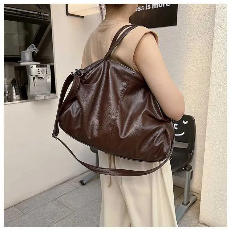 Large black shoulder large homeless shopping solid color high-quality leather cross body handbag womens travel bag_voghion.com