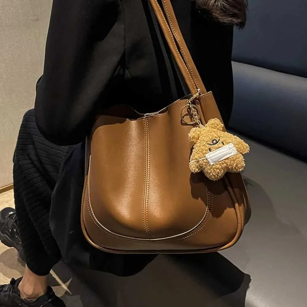 Bolso de hombro de alta gama con textura de gran capacidad, nuevo bolso de mano para mujer, otoño e invierno 2024, C241106_voghion.com