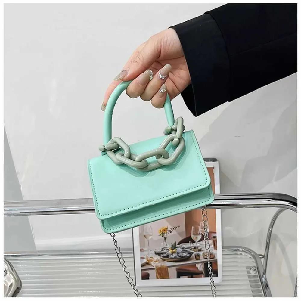 Designer 2024 Femmes Horizontal Édition Coréenne Chaîne Petit Carré Mode Mini Sac À Bandoulière Flip Boucle Sac À Main Portefeuille_voghion.com