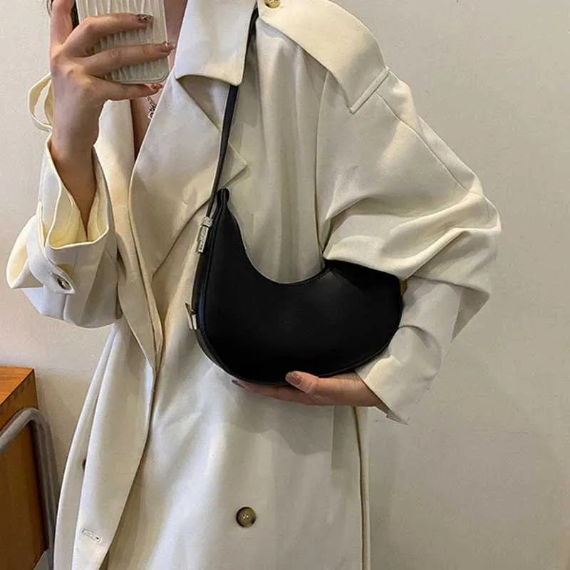 Borsa a spalla a mezzaluna donna elegante in ecopelle_voghion.com