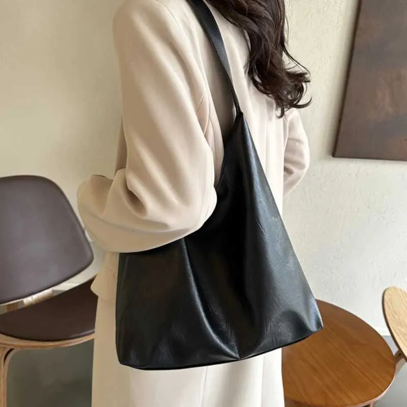 Design classico, alla moda, senso coreano e grande capacità, morbida pelle, tracolla da pendolare sotto le ascelle per ufficio_voghion.com