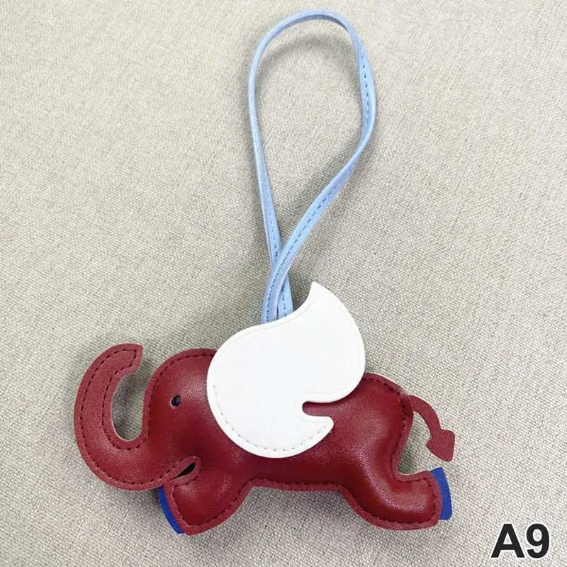Designer de modă din piele PU aripi zburătoare elefant umeraș breloc pandantiv pentru femei accesorii pentru geantă de mână_voghion.com
