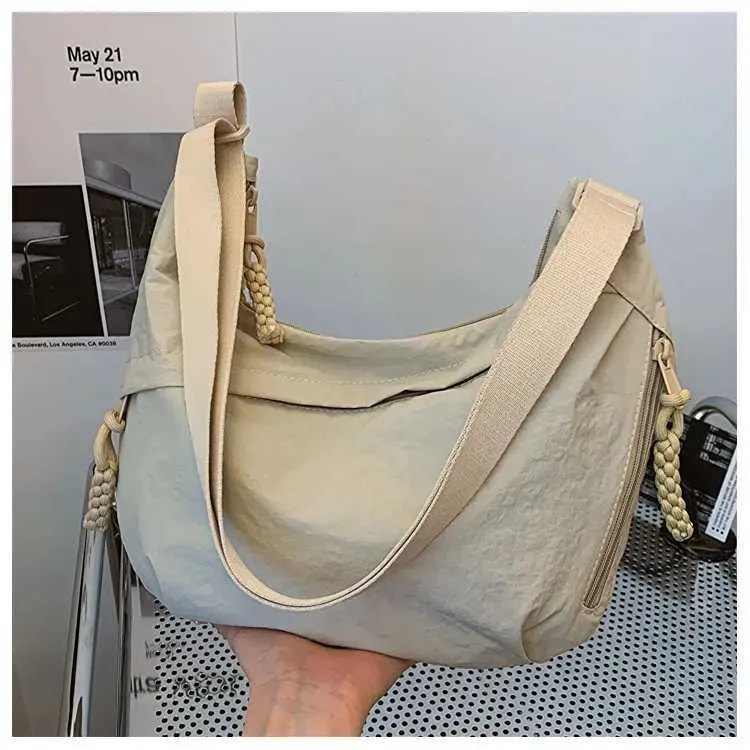 Version coréenne à la mode et minimaliste dumpg populaire cette année, nouveau sac à bandoulière de haute qualité, fourre-tout de grande capacité_voghion.com