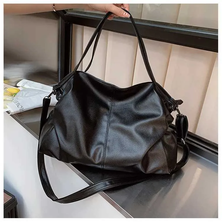 Large black shoulder large homeless shopping solid color high-quality leather cross body handbag womens travel bag_voghion.com