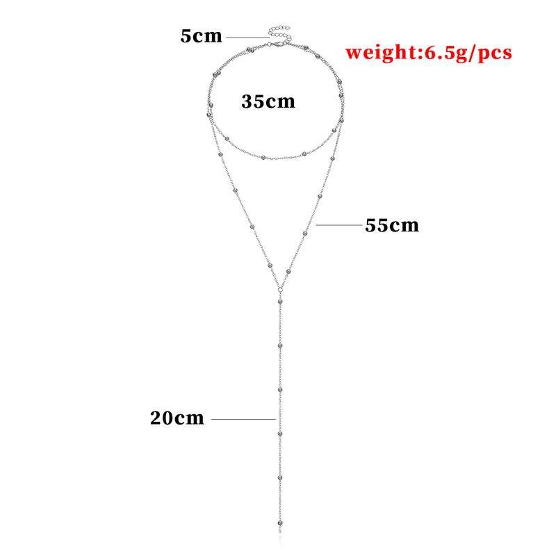 Collier long multicouche à pampilles géométriques exagérées et à la mode pour femmes_voghion.com