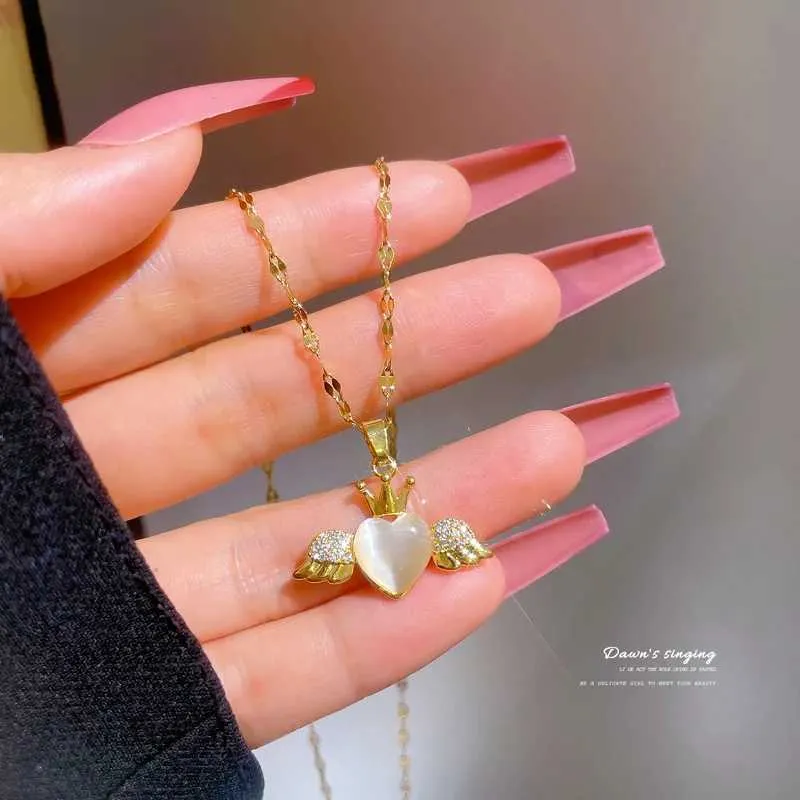 Collana girocollo con catena in acciaio inossidabile, ciondolo a forma di cuore con corona in stile gotico, colore oro, per donne_voghion.com