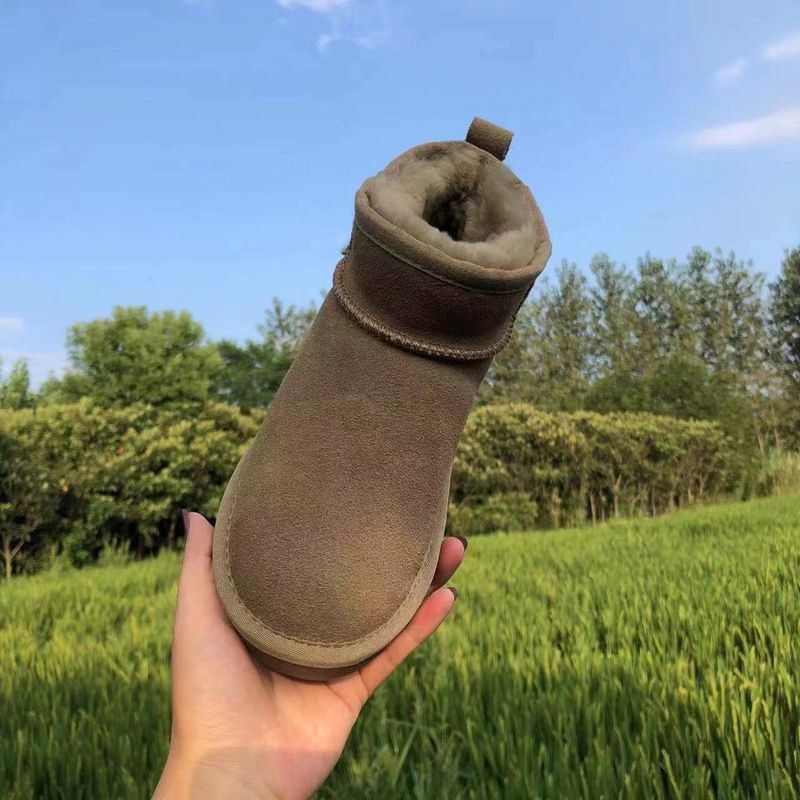 Rindslederwolle Braun Flache Absätze Lederfell Integrierte Runde Zehen Klebeschuhe Niedrig Geschnittene Mini-Schneestiefel_voghion.com