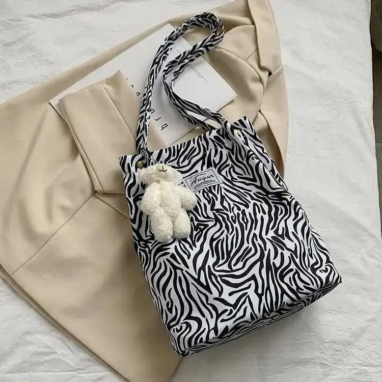 Sac à main en toile imprimé léopard pour femme, mode coréenne décontractée, nouveau sac de shopping, sac à main imprimé pour étudiant, Bolsa Mujer Y241026_voghion.com