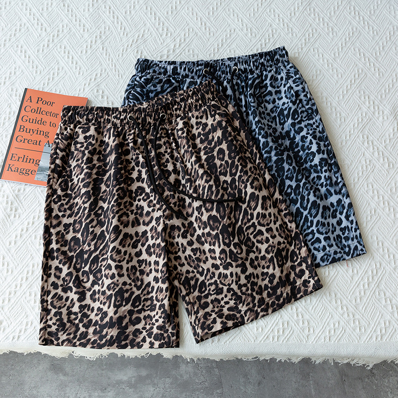 Vêtements pour hommes été 5 points imprimé léopard shorts hommes vêtements d'extérieur décontractés pantalons de plage couple mode 5 points pantalons shorts tendance_voghion.com