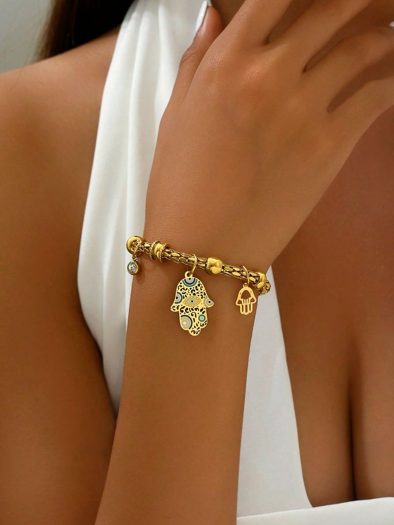 Nerūsējošā tērauda piekariņu aproce sievietēm zelta krāsas Hamsa rokas formas aproce_voghion.com