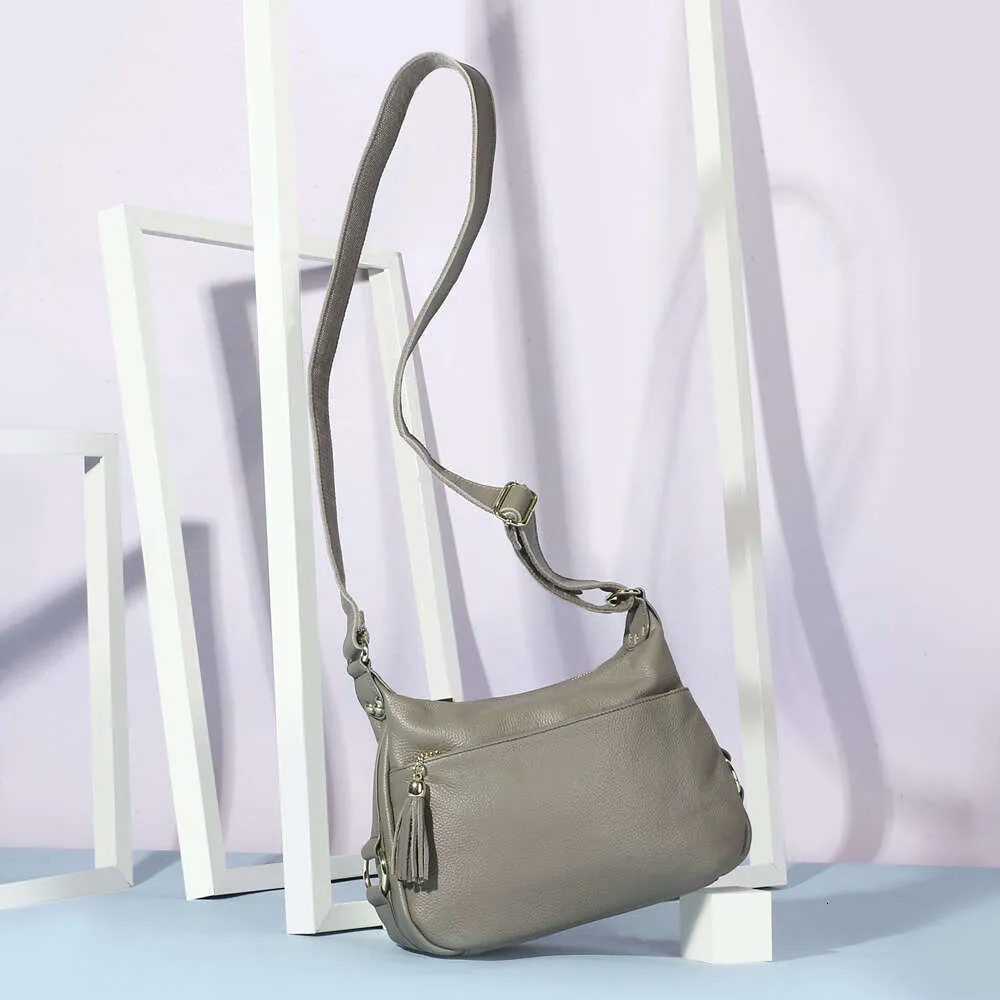 Zency 100% ægte læder moderigtig dameskuldertaske med kvast høj kvalitet hobos elegante dame crossbody-tasker sort_voghion.com