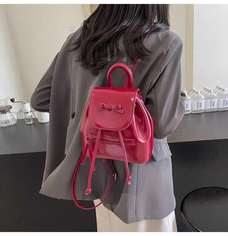 Mochila feminina sólida com aba e laços, mini bolsas de ombro, versátil, feminina, grande capacidade, bolsas de couro, casual, estudante_voghion.com