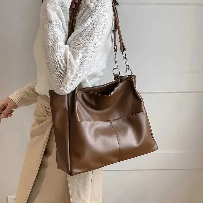 Sacs à bandoulière pour femmes Vintage Couleur unie Simple Grande capacité Grand cuir PU Les derniers sacs à main de voyage_voghion.com