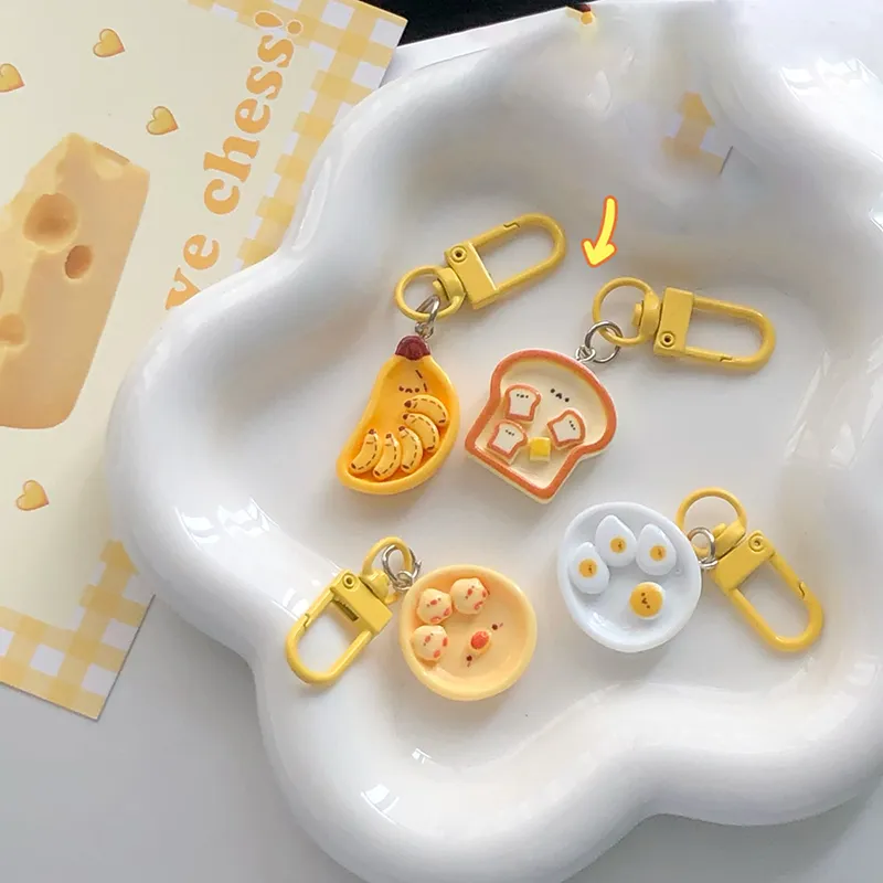 Portachiavi con simpatico cartone animato, uovo in camicia, banana e toast, creativo, per la colazione, decorazione per zaino, borse, ciondolo_voghion.com