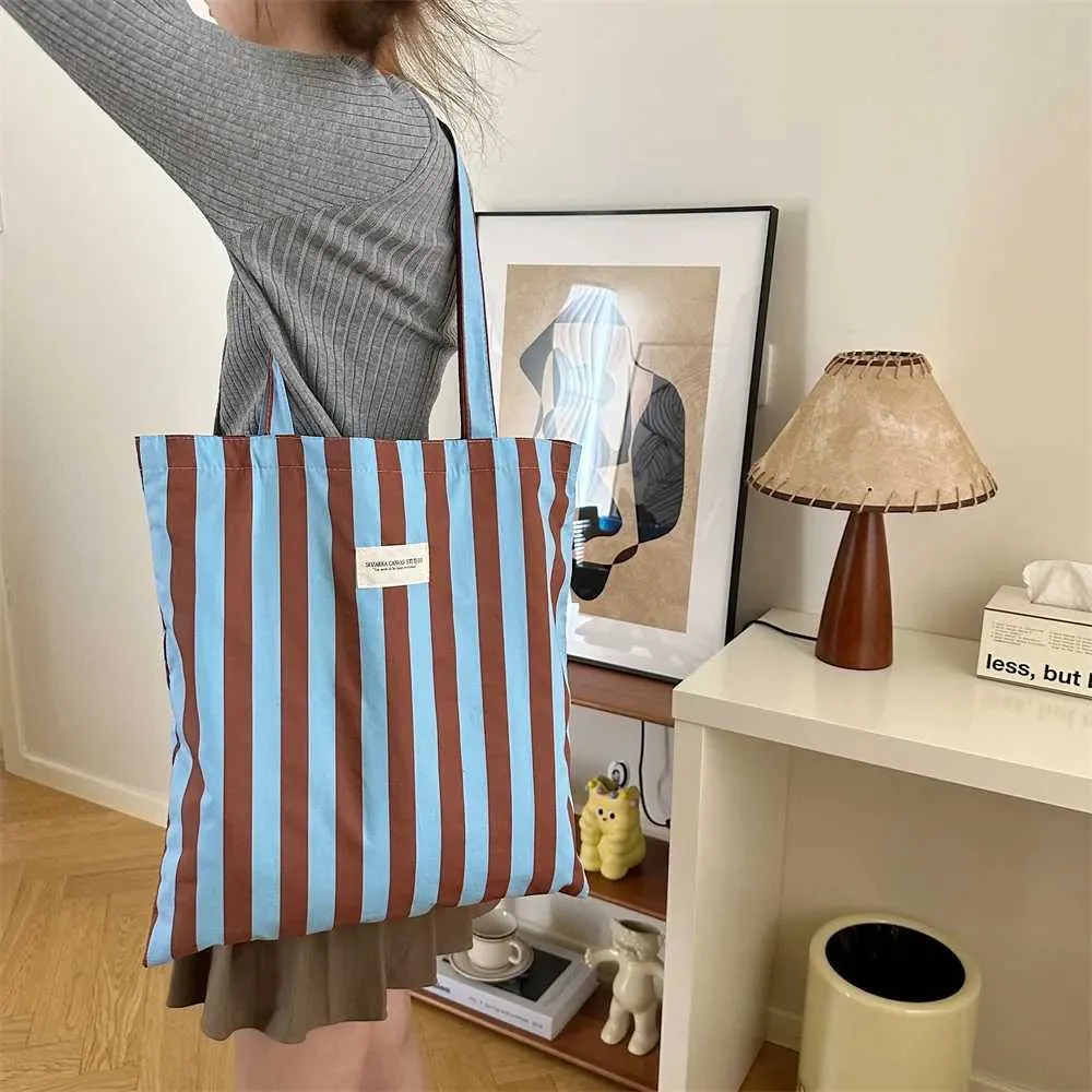 Vintage gestreifte warme Leinwand große Kapazität tägliche Einkaufstasche lässig tragbare Damen Reisehandtasche Y241109_voghion.com