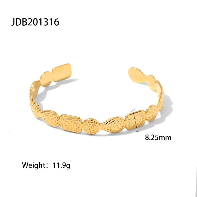 Bracciale in acciaio al titanio di forma irregolare, placcato oro, alla moda, versatile, con motivo a vulcano aperto, per donna_voghion.com