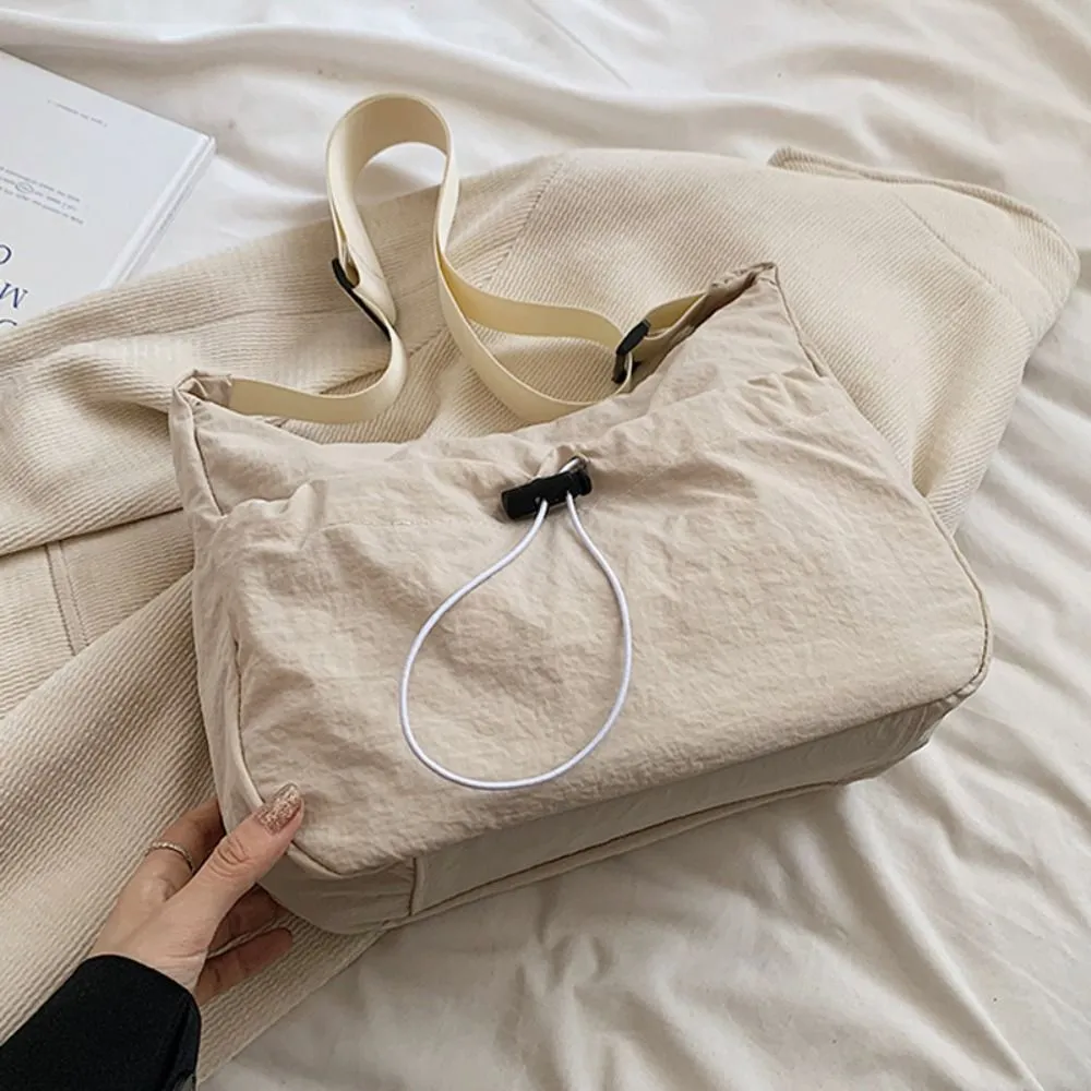 Borsa a tracolla in tela stile coreano con tracolla regolabile in nylon con coulisse e tracolla in tinta unita_voghion.com